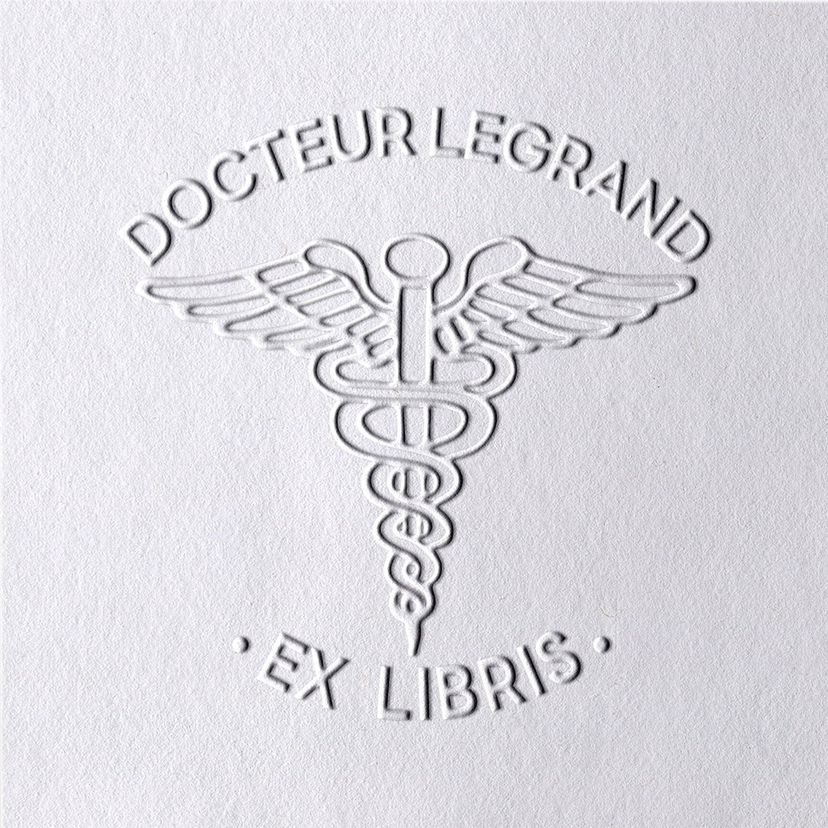 Sello en Seco Personalizado de Caduceo Ex Libris para Libros2